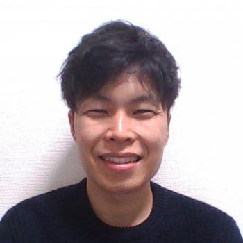 AT